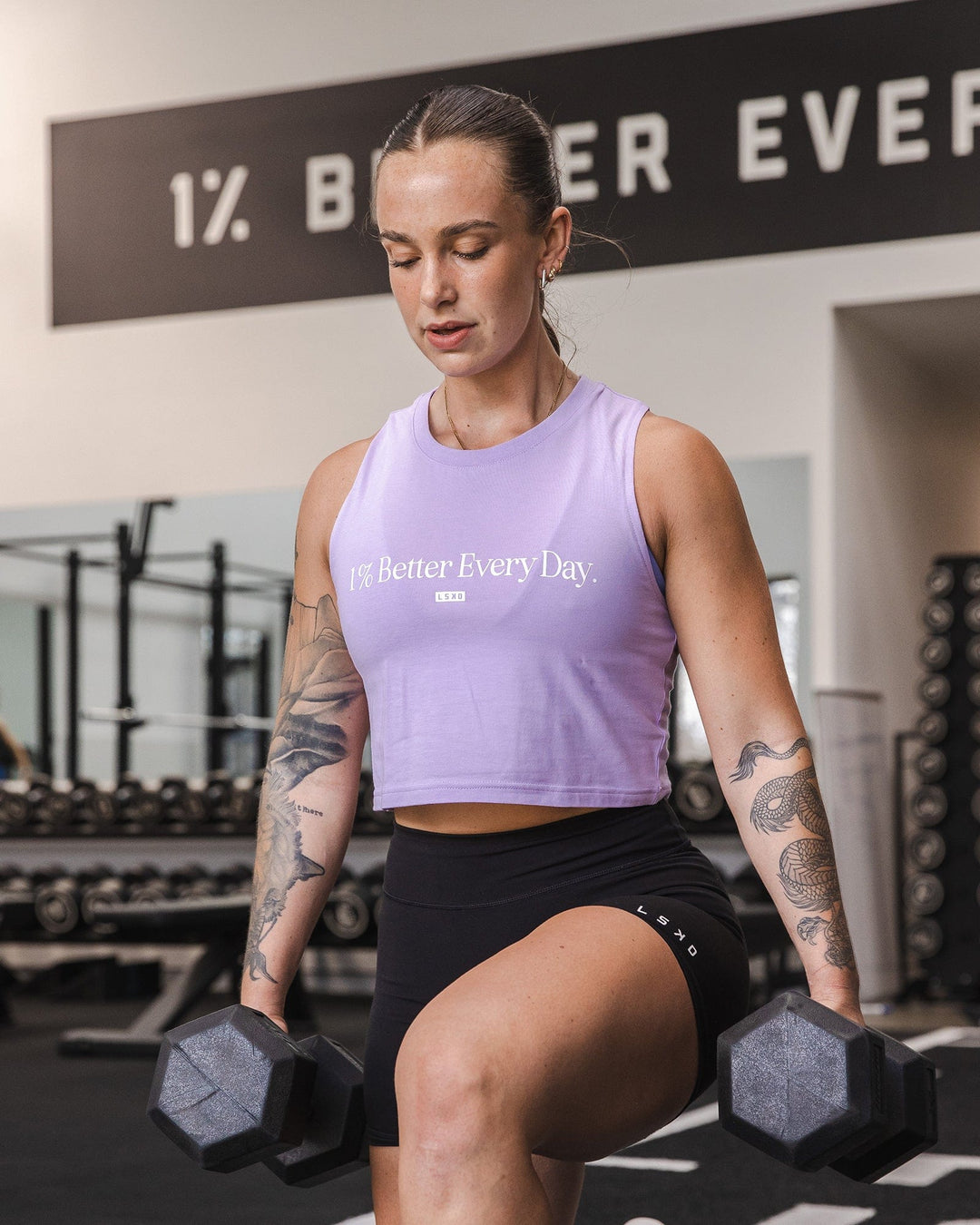 Woman wearing 1% Better FLXCotton Tank - Purple-White