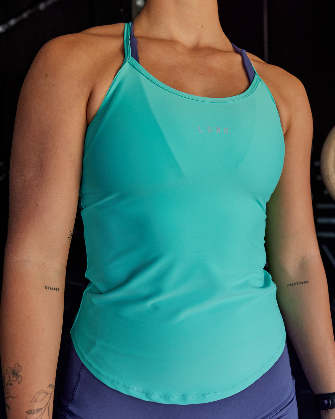 Woman wearing Agility Active Tank - Aquatic Awe