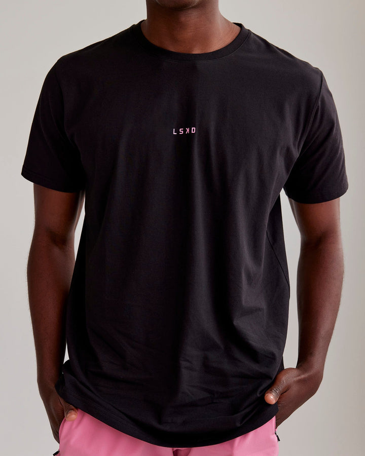 Man wearing Base FLXCotton Tee - Black-Pink Rose