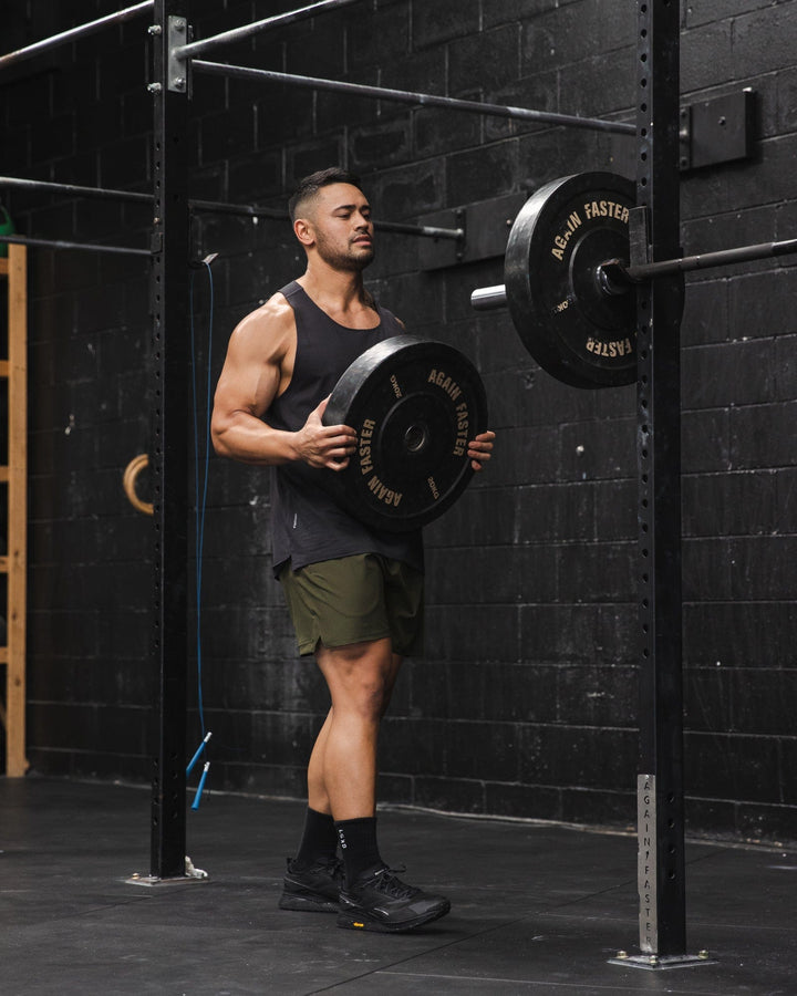 Man wearing Challenger 6" Performance Short Linerless - Forest Night