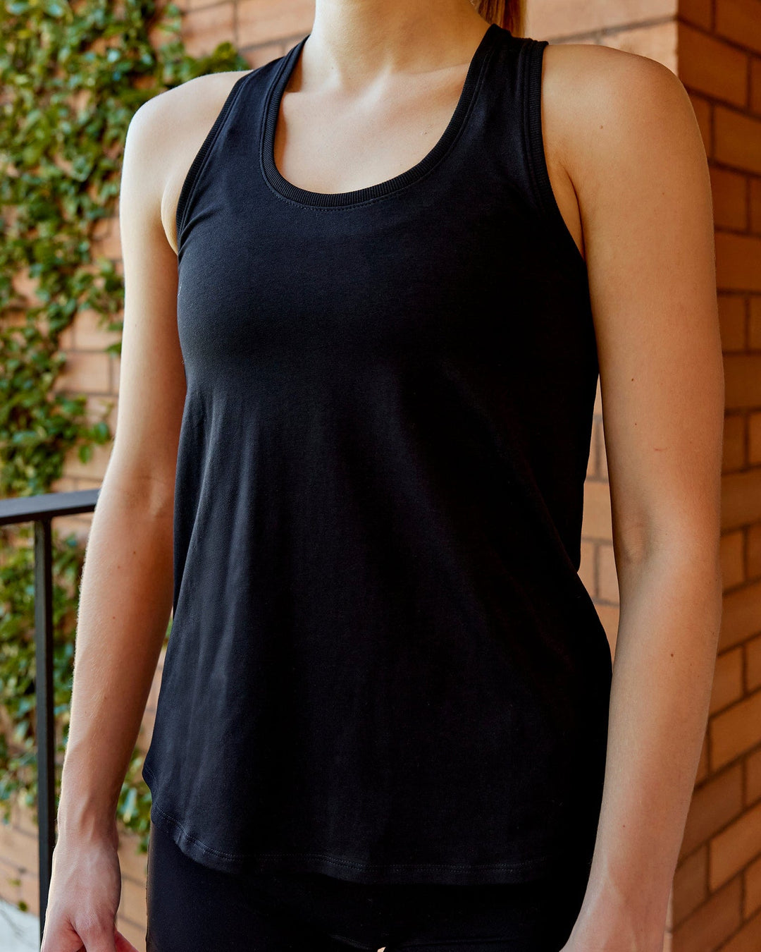 Woman wearing Charge PimaFLX-Lite Active Tank - Black