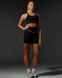 Woman wearing Contrast Ultra High-Rise 6" Short - Black-White