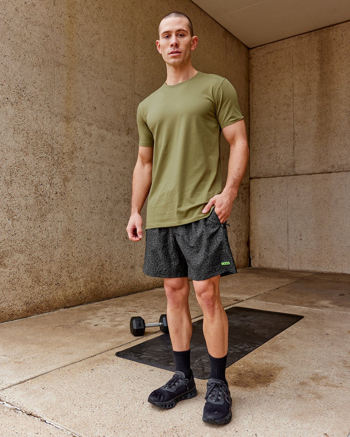 Man wearing Deluxe PimaFLX Tee - Moss Stone