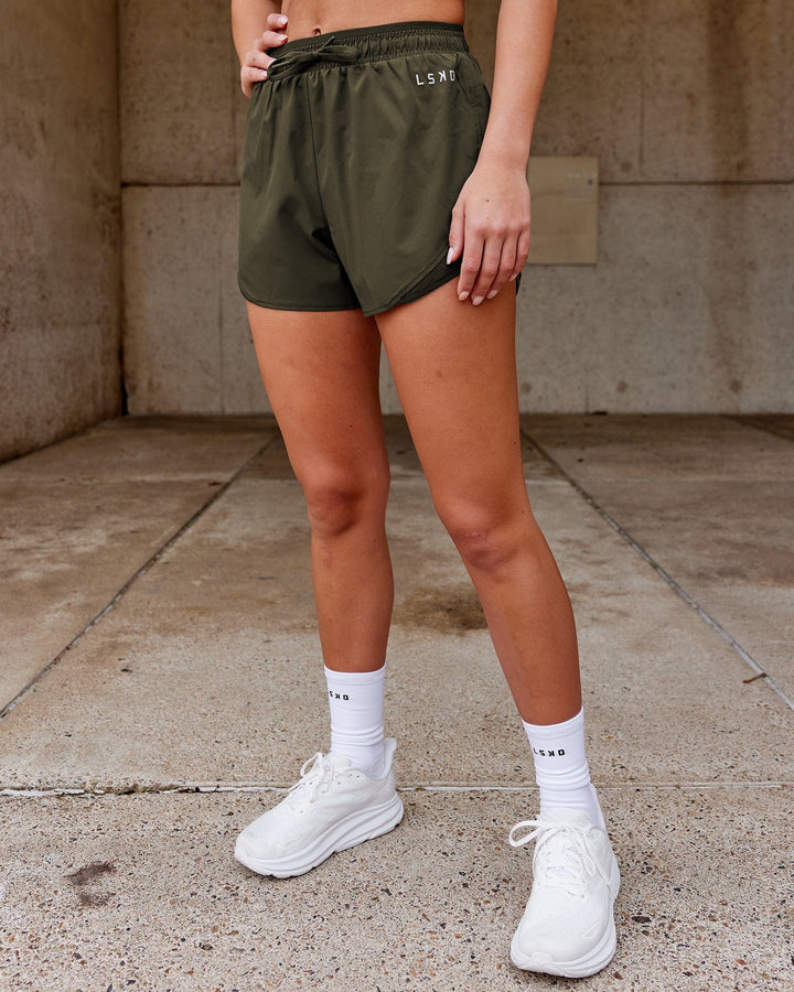 Woman wearing Dynamic Run Short - Forest Night