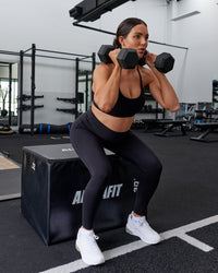 Woman wearing Elixir Ultra High-Rise Maternity Full Length Legging - Black | Model:Amanda | Size:S