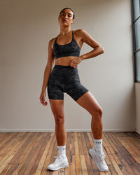 Woman wearing Elixir Ultra High-Rise 6" Short - Black Camo  | Model:Demi | Size:S
