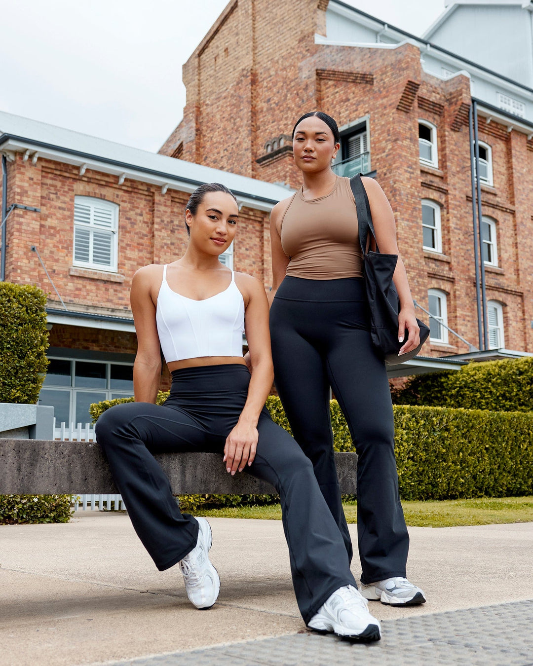 Woman wearing Fusion Ultra High-Rise Flared Legging - Black | Size:Duo