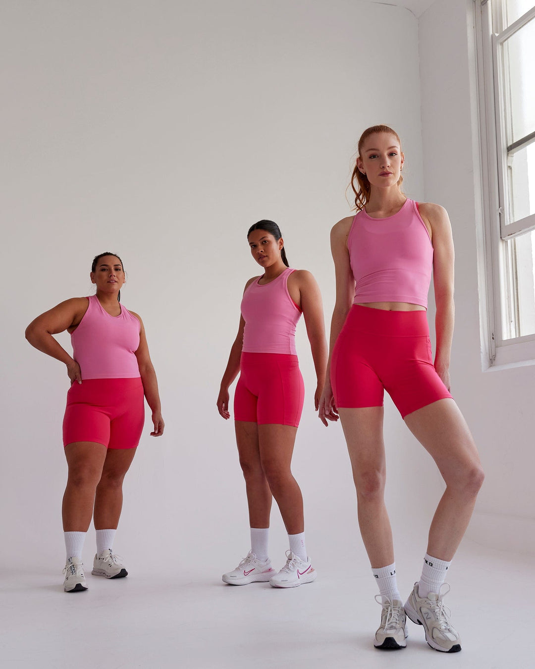 Woman wearing Flow Performance Tank - Pink Rose