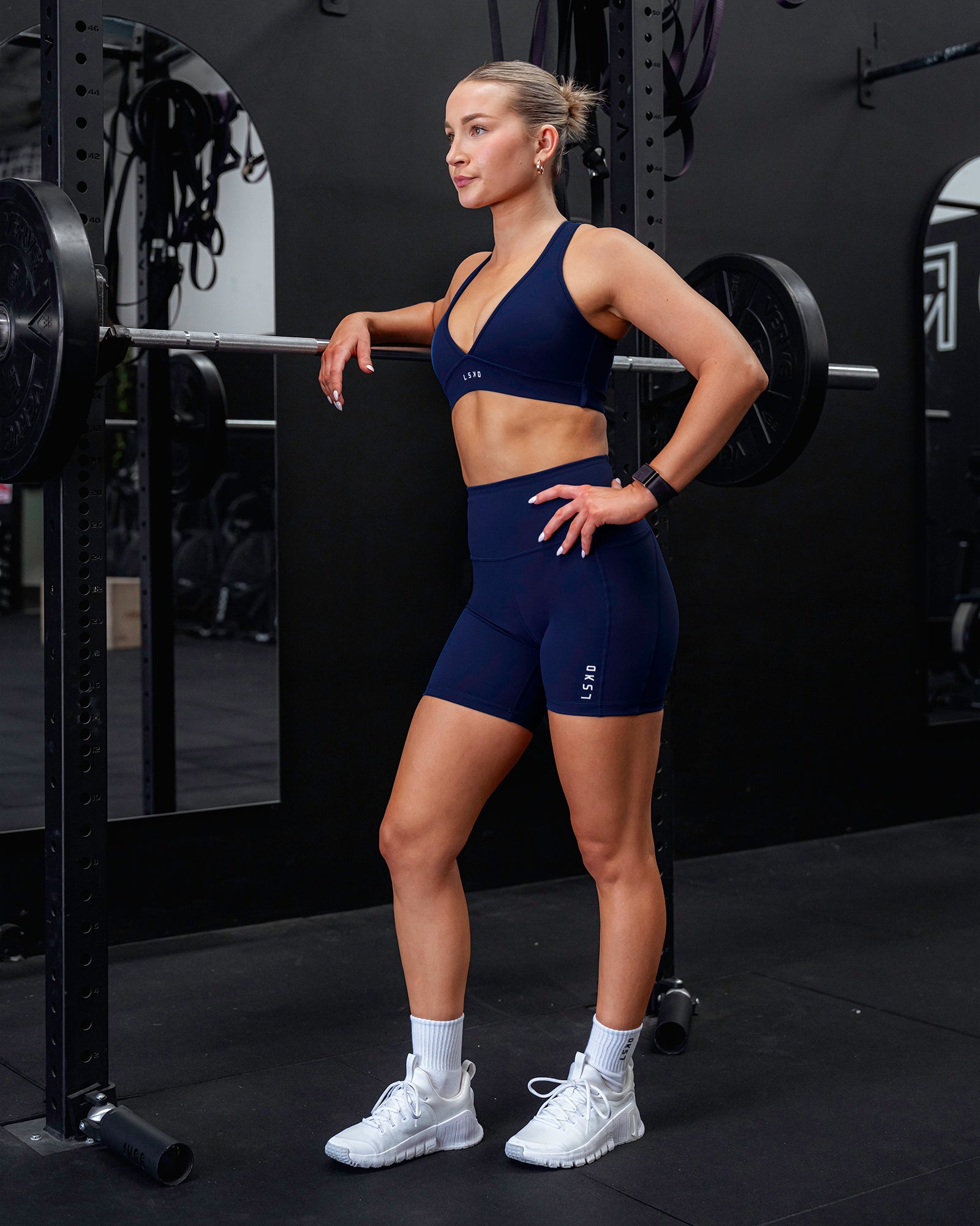 Woman wearing Flux Ultra High-Rise 6" Short Pockets - Midnight Blue