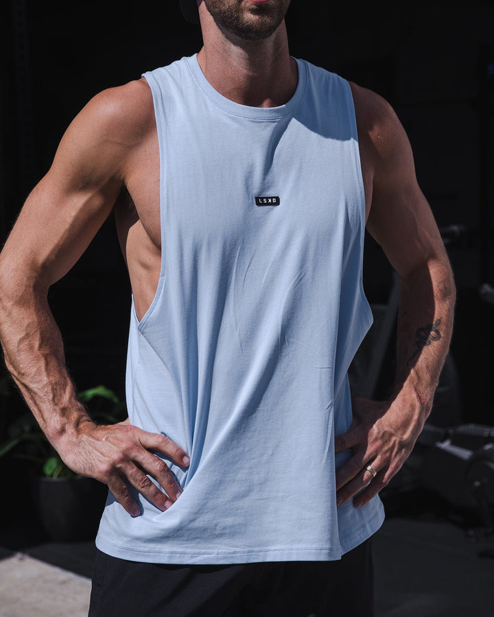Man wearing Fundamental FLXCotton Drop Arm Tank - Windsurfer