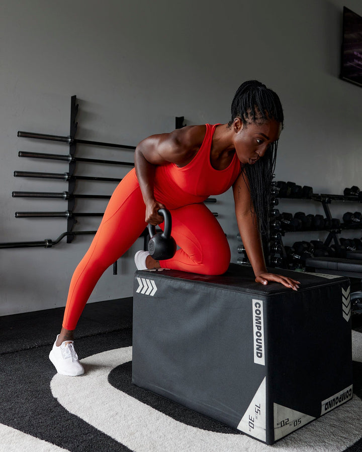 Woman wearing Fusion Full Length Tights - Infrared