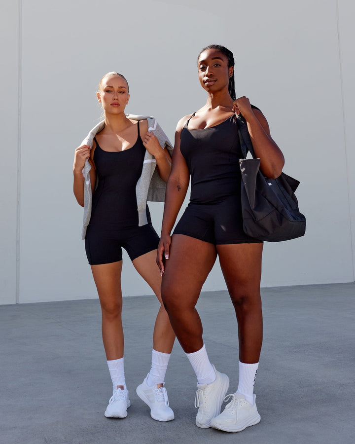 Woman wearing Helix Active Bodysuit - Black