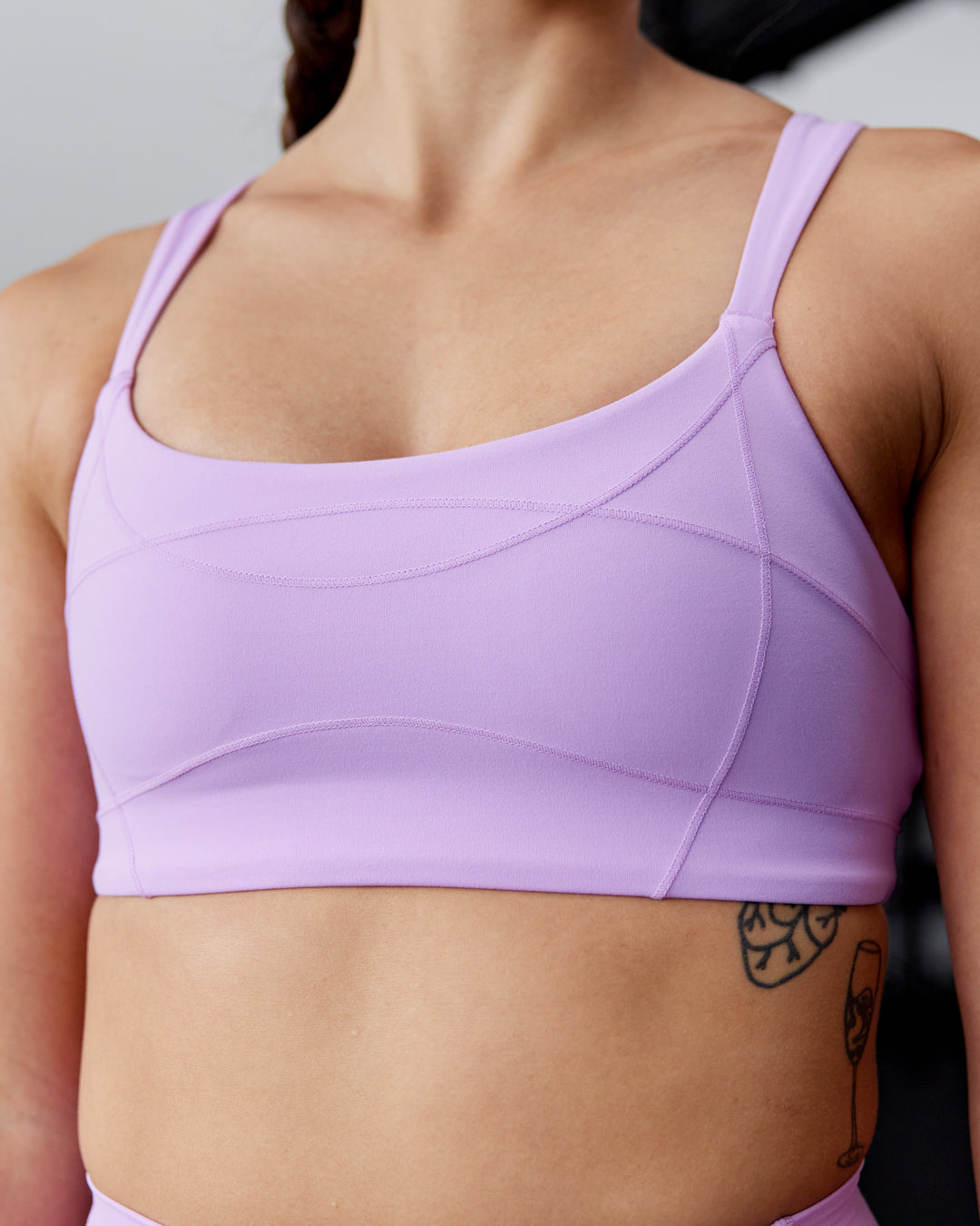 Woman wearing Inertia Sports Bra - Light Violet