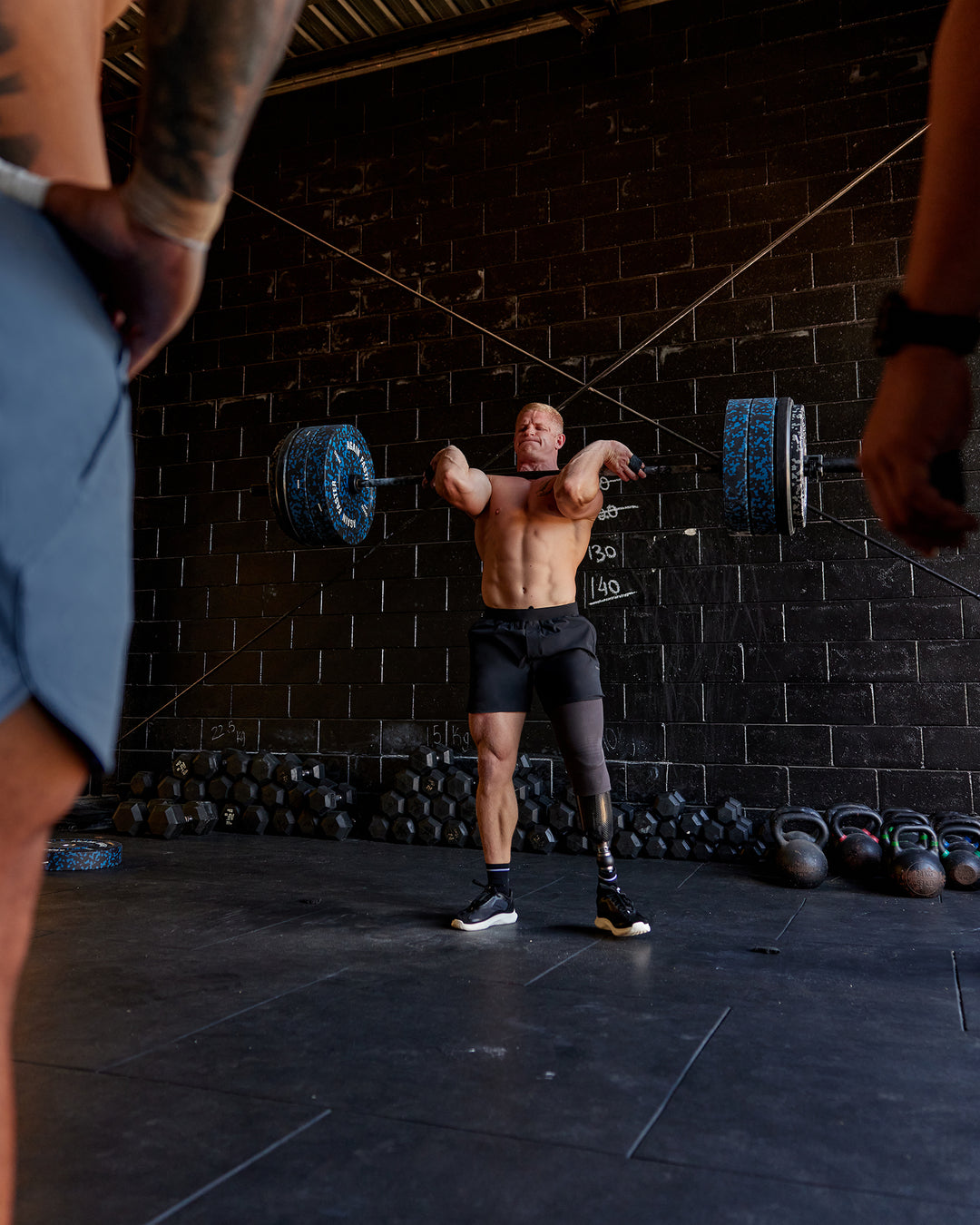 Man wearing Lift 6&quot; Performance Shorts - Black-Reflective