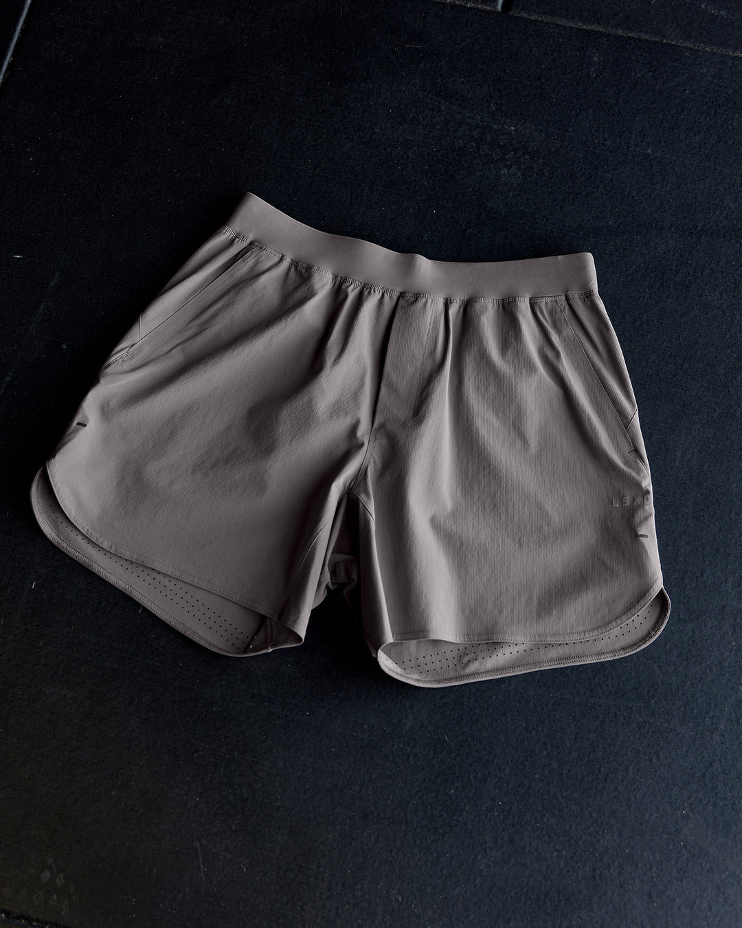 Man wearing Lift 6" Performance Shorts - Storm Front