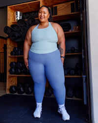 Woman wearing Lift Performance Tank - Glacial Blue