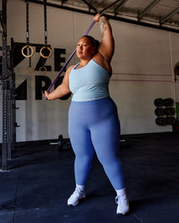 Woman wearing Lift Performance Tank - Glacial Blue