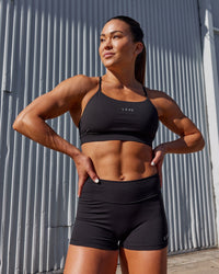 Woman wearing Lift Sports Bra - Black