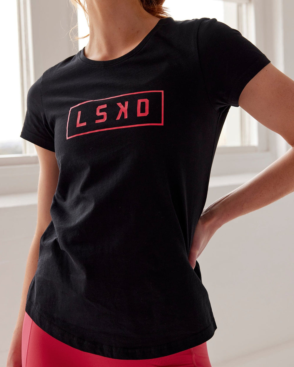 Woman wearing Luna Tee - Black-Raspberry