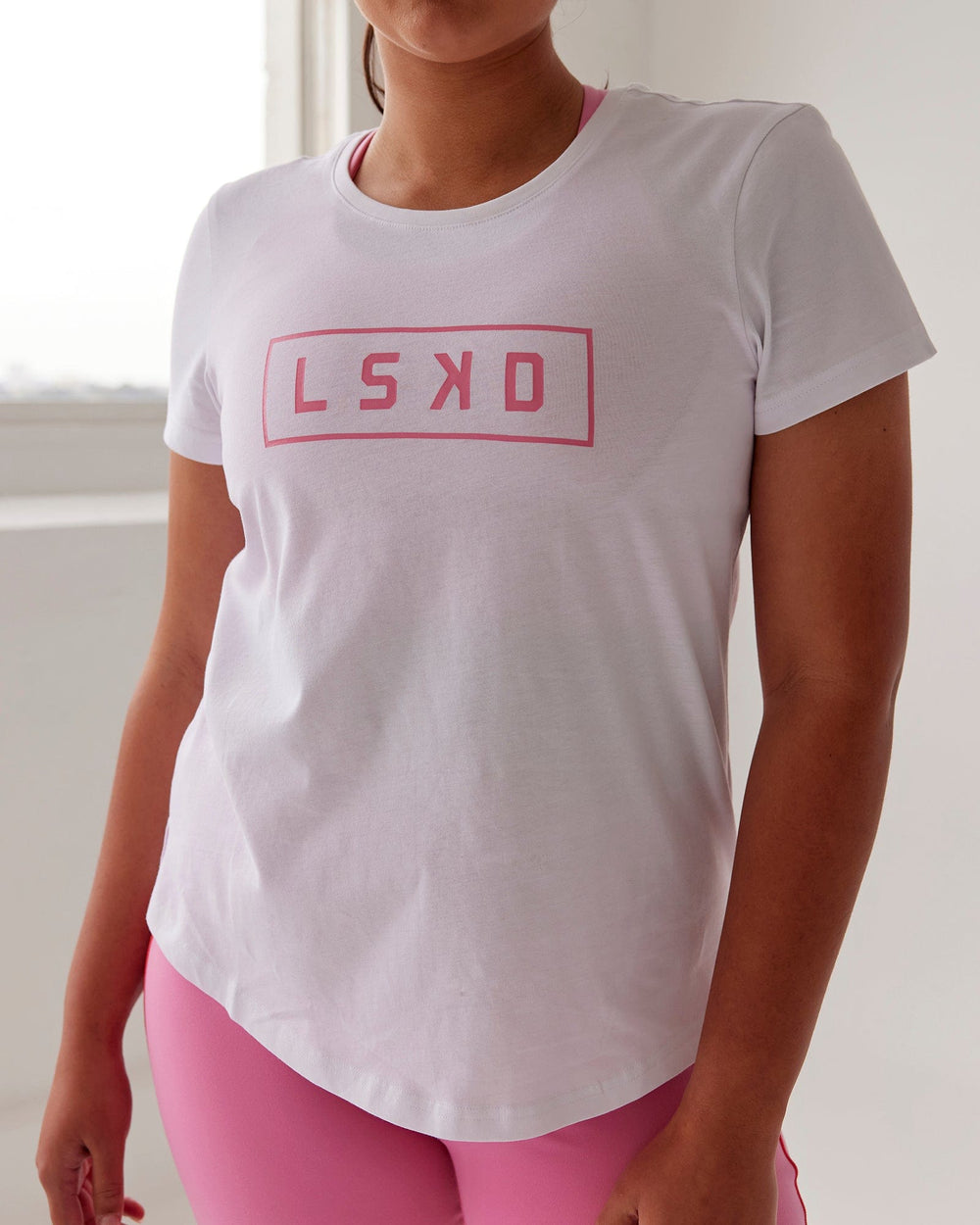 Woman wearing Luna Tee - White-Pink Rose