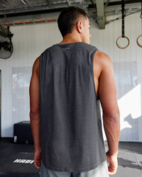 Man wearing AeroFLX+ Seamless Muscle Tank - Pirate Black Marl