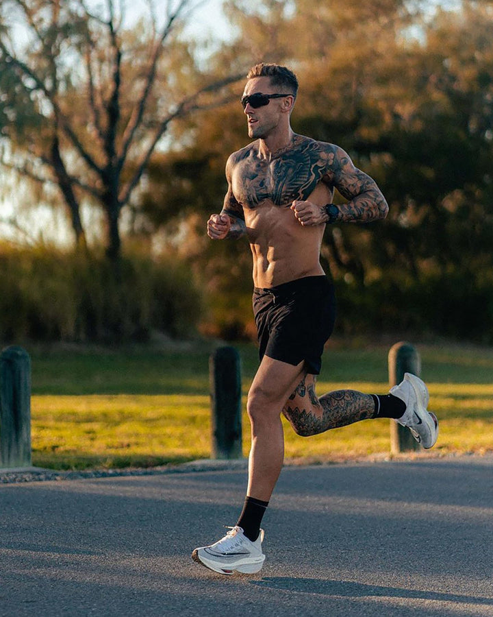 Man wearing UltraAir 6" Lined Performance Short - Black