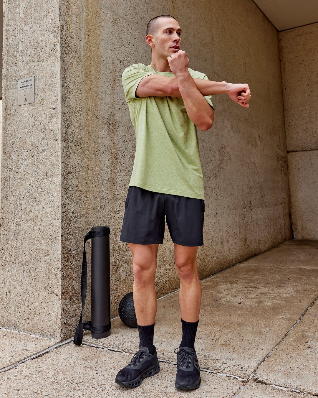 Man wearing Perform VapourFLX Tee - Moss Stone