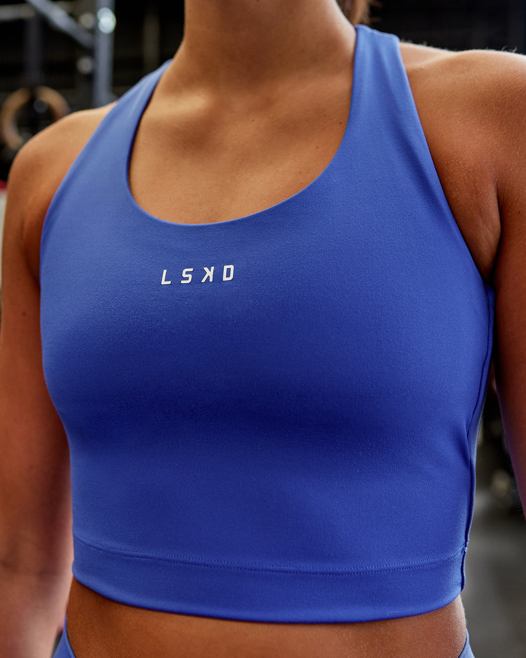 Woman wearing Pulse Active Tank - Power Cobalt