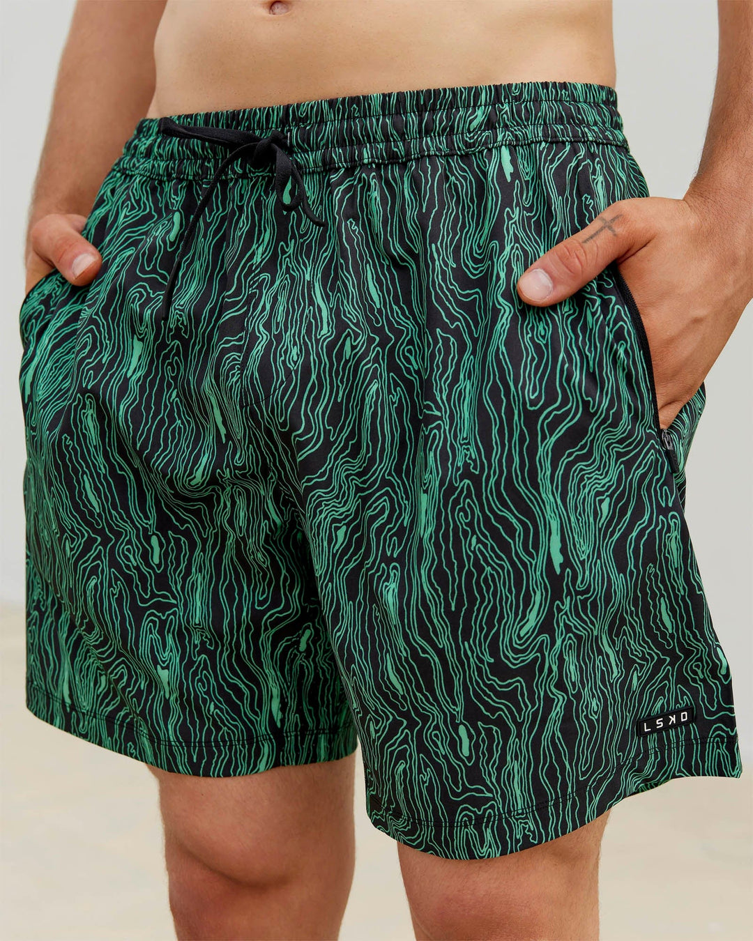 Man wearing Rep 7'' Performance Shorts - Topographic Black-Lime