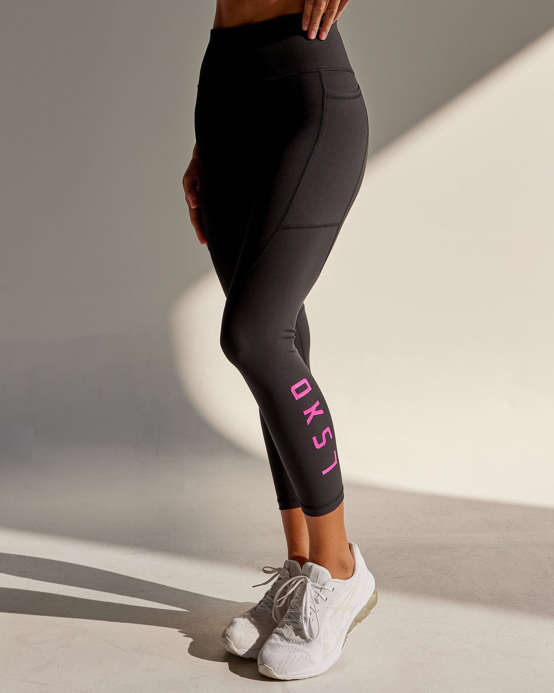 Woman wearing Rep 7/8 Length Tight - Black-Neon Magenta