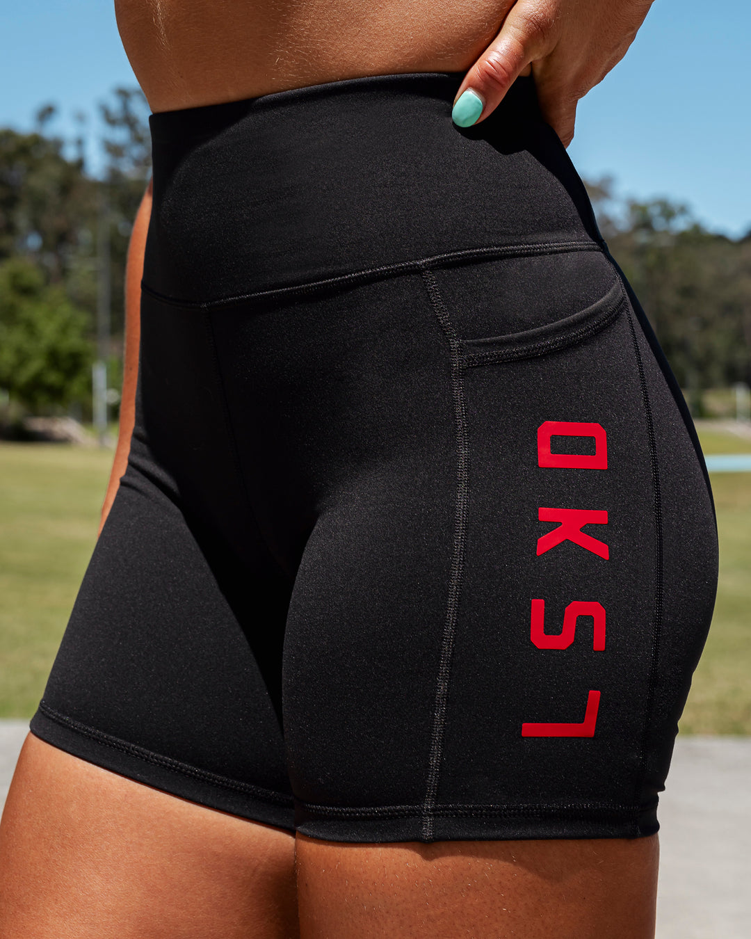 Woman wearing Rep Ultra High-Rise 6&quot; Short Pockets - Black-Bailey | Model:Monique | Size:S
