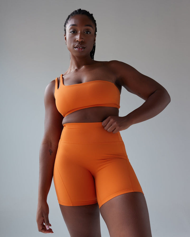 Woman wearing Set Up Sports Bra - Burnt Orange