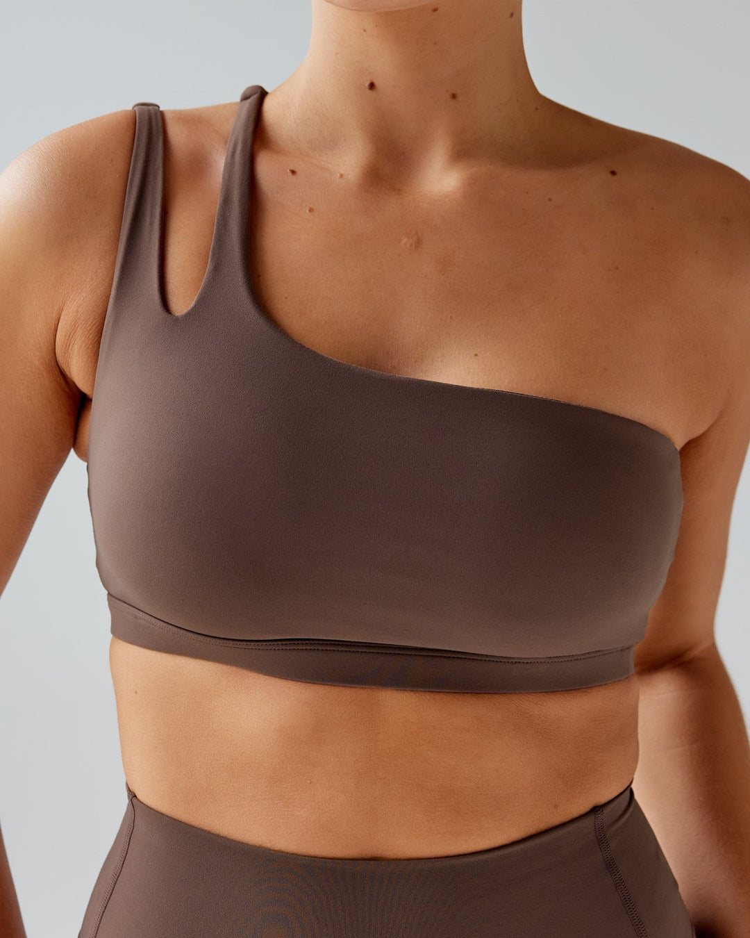 Woman wearing Set Up Sports Bra - Peppercorn