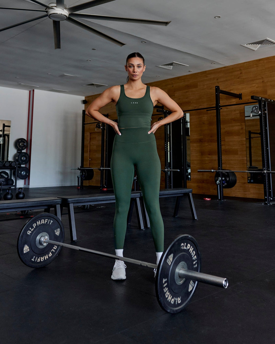 Woman wearing Staple Active Cropped Tank - Vital Green