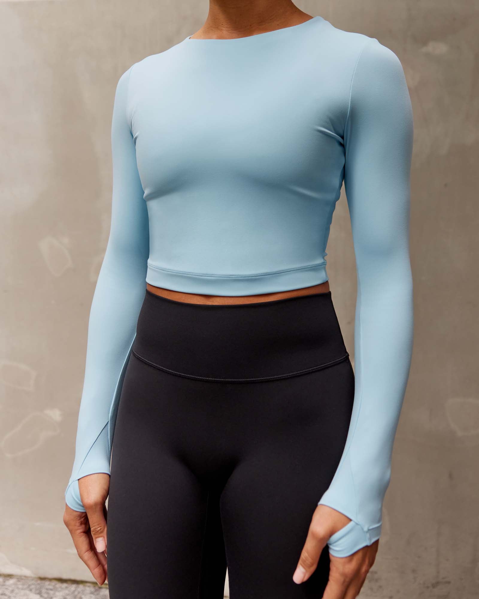 Woman wearing Staple LS Cropped Tee - Glacial Blue