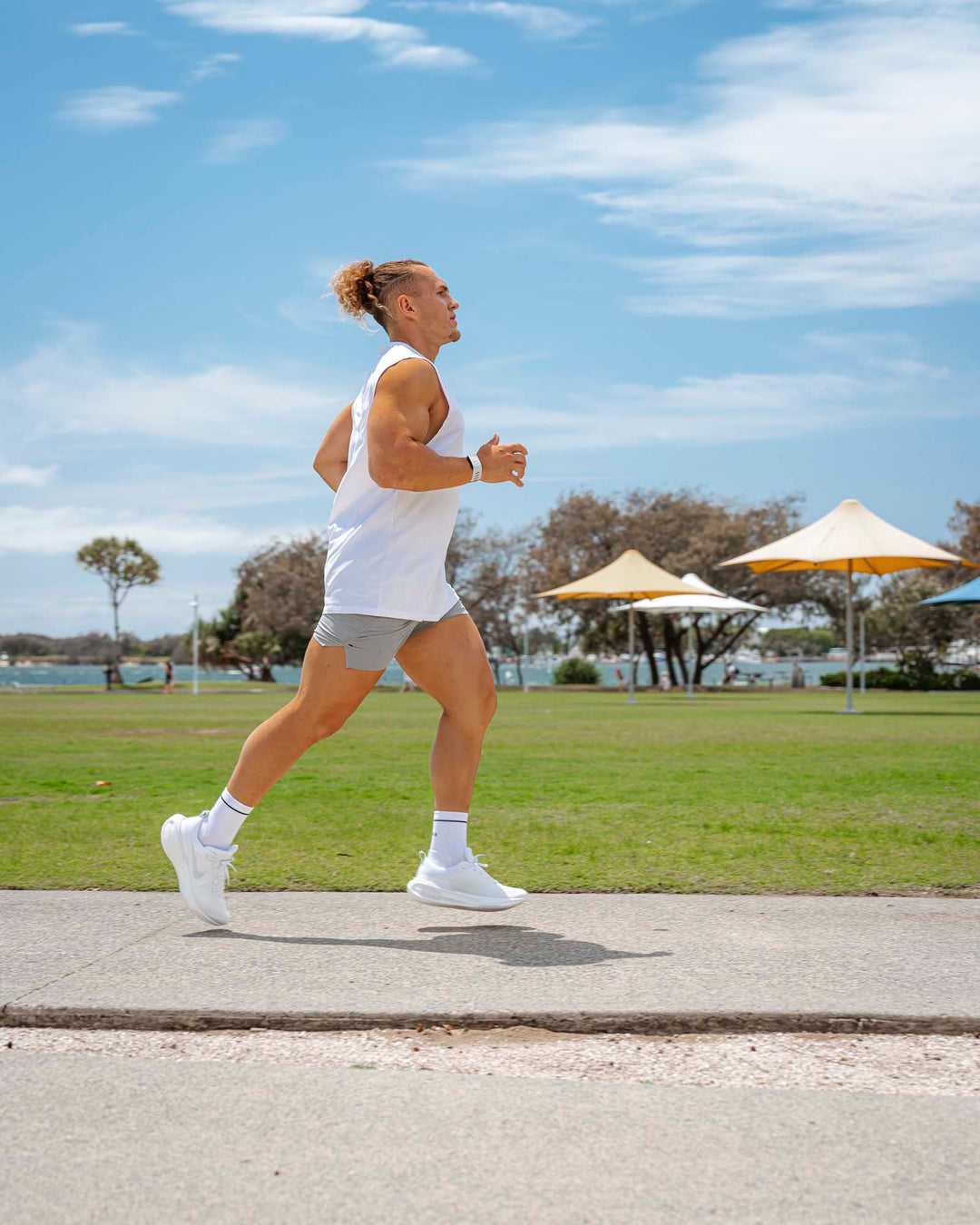 Man wearing UltraAir 5" Lined Performance Shorts - Circular Grey