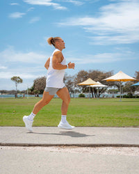 Man wearing UltraAir 5" Lined Performance Shorts - Circular Grey
