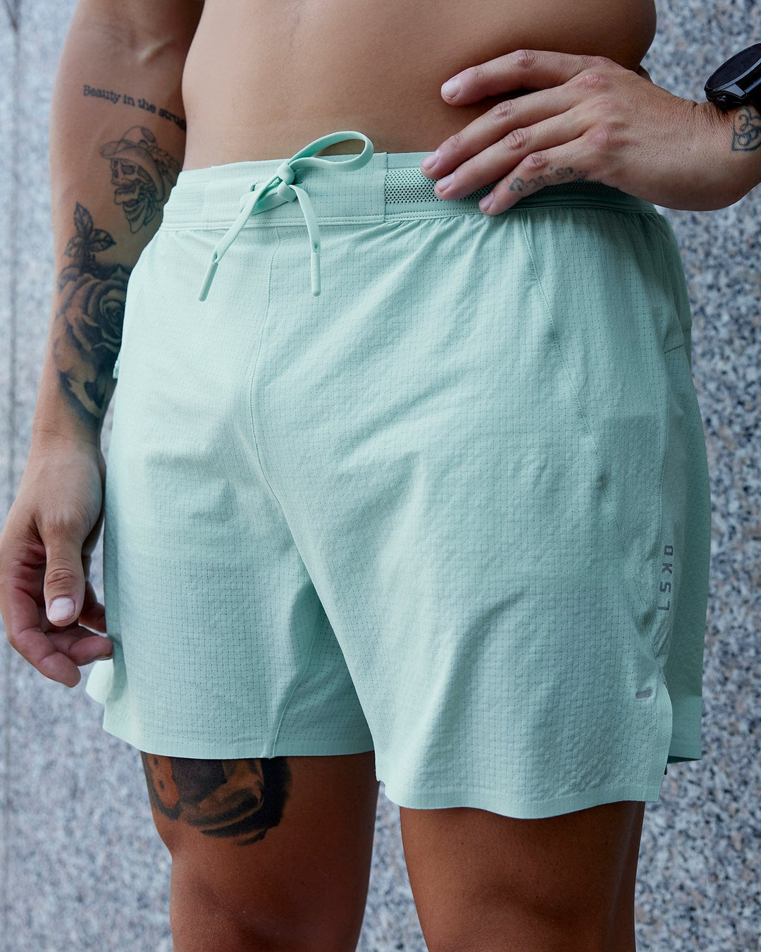 Man wearing UltraAir 5&quot; Lined Performance Short - Pastel Turquoise-Reflective