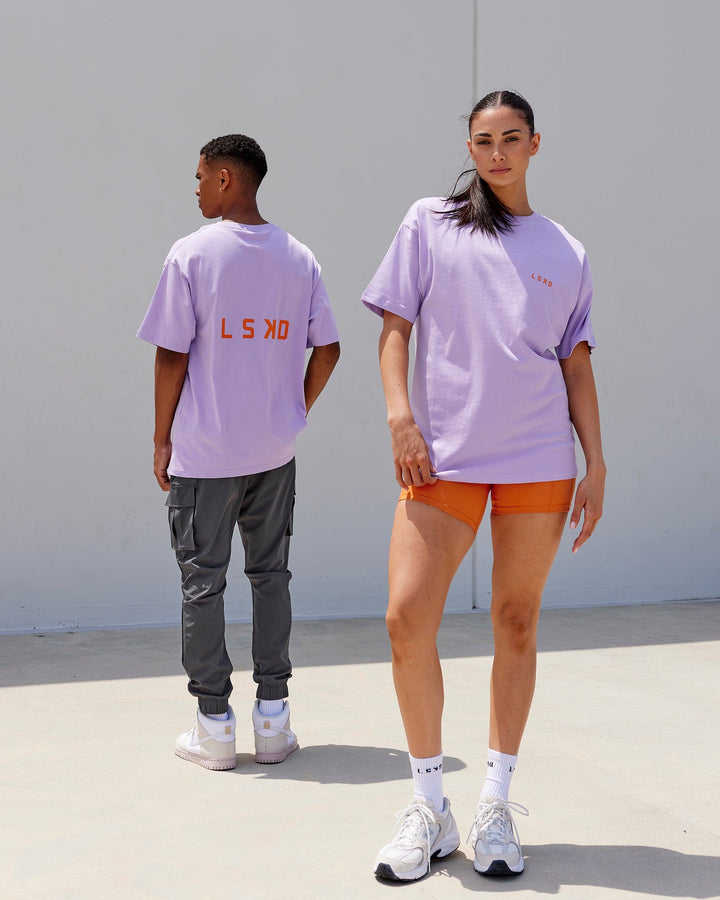 Duo wearing Unisex Endeavour Heavyweight Tee Oversize - Pale Lilac-Impact Orange