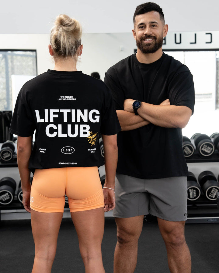Duo wearing Unisex Lifting Club FLXCotton Tee Oversize - Black-White-Yellow