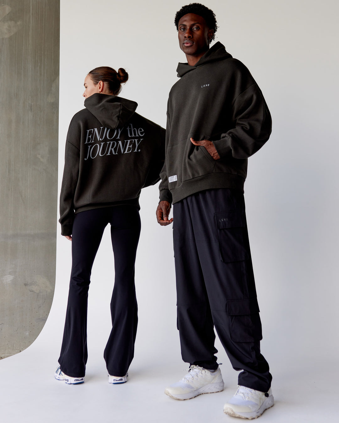 Duo wearing Unisex VS1 Hoodie Oversize - Pirate Black-Circular Grey