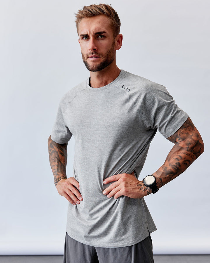 Man wearing Perform VapourFLX Tee - Lt Grey Marl