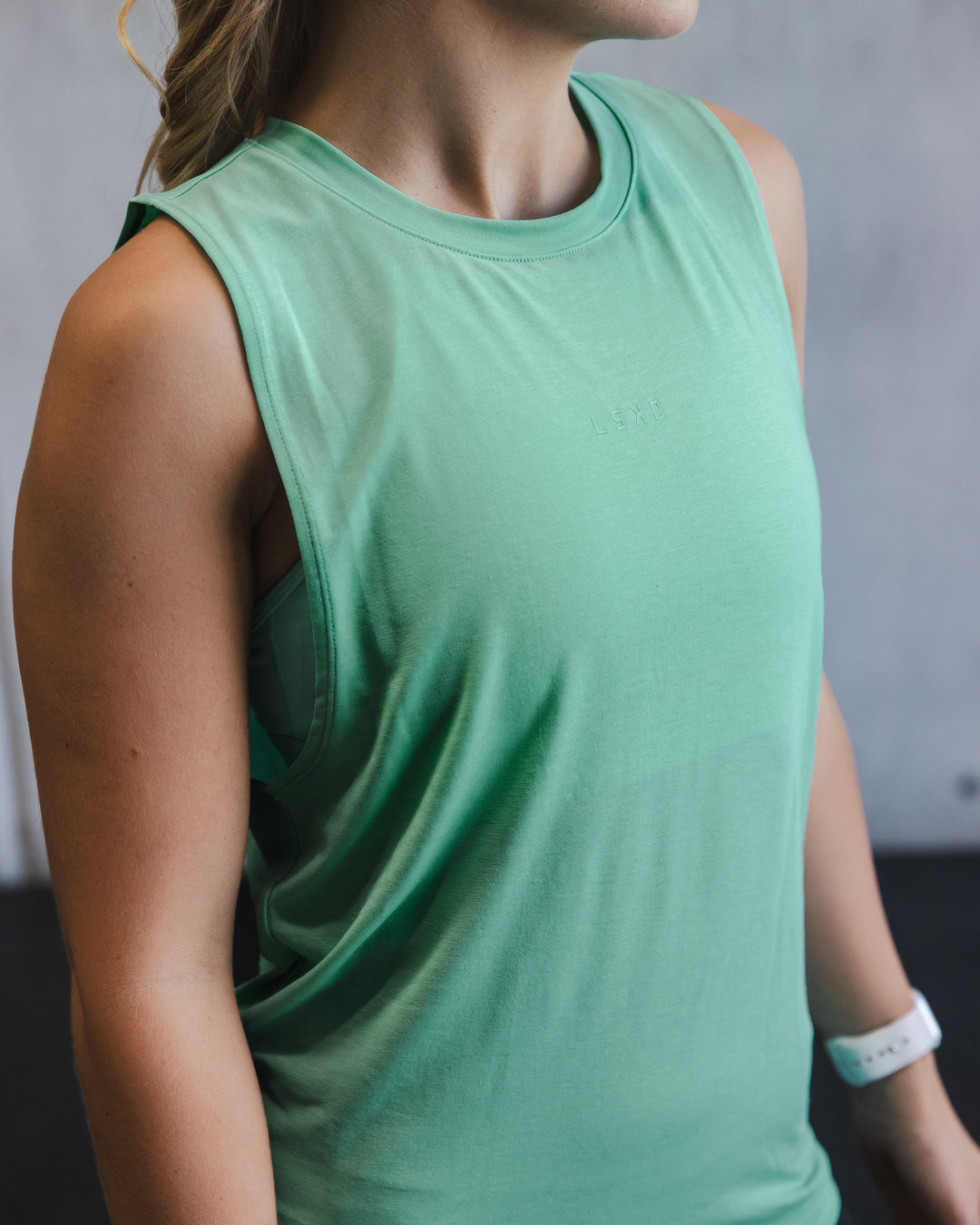 Woman wearing Vital Training Tank - Cockatoo