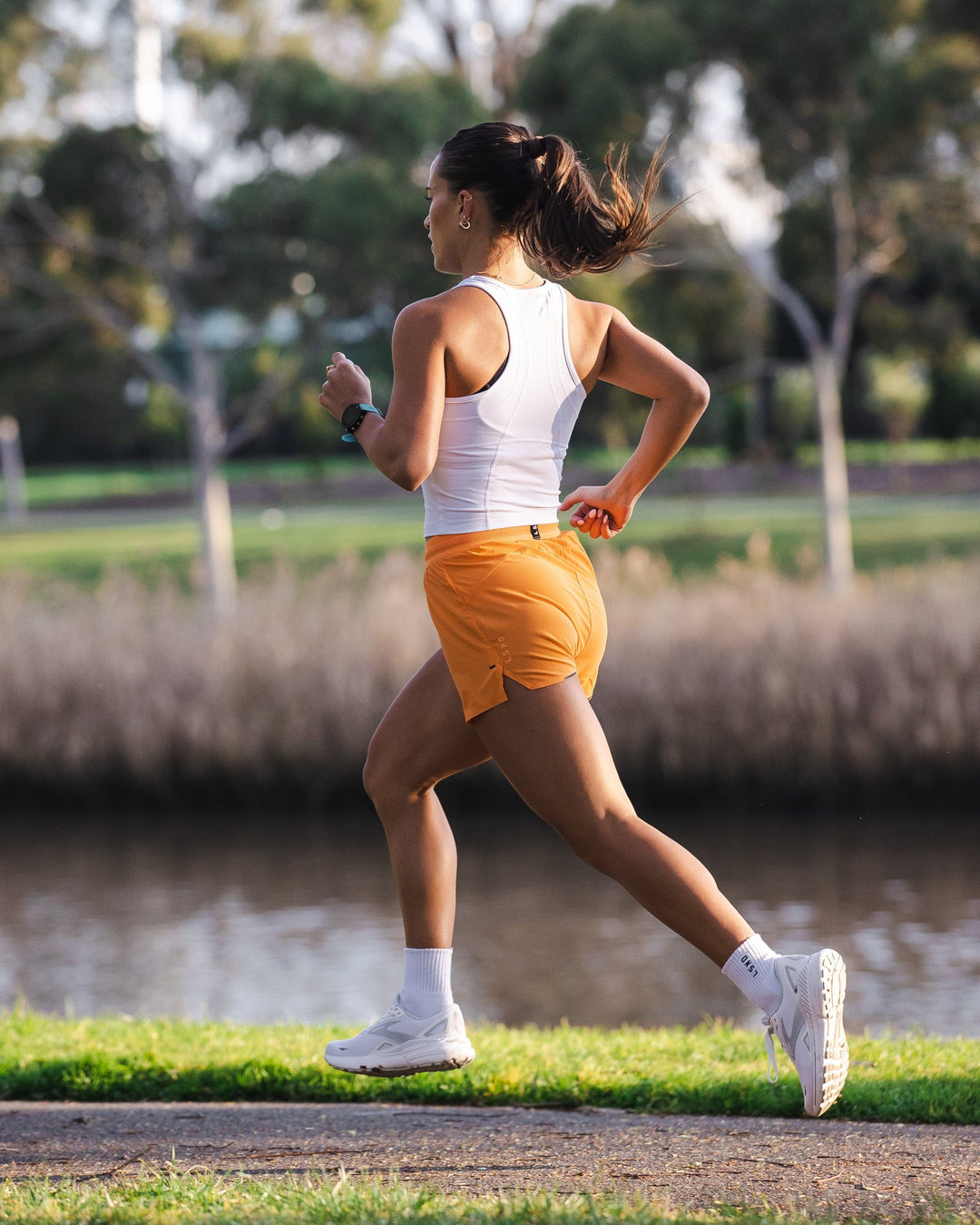 Woman wearing Ultra Air Lined Performance Short - Nectarine