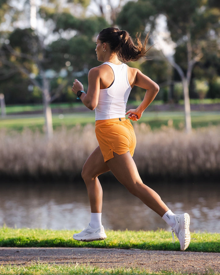 Woman wearing Ultra Air Lined Performance Short - Nectarine