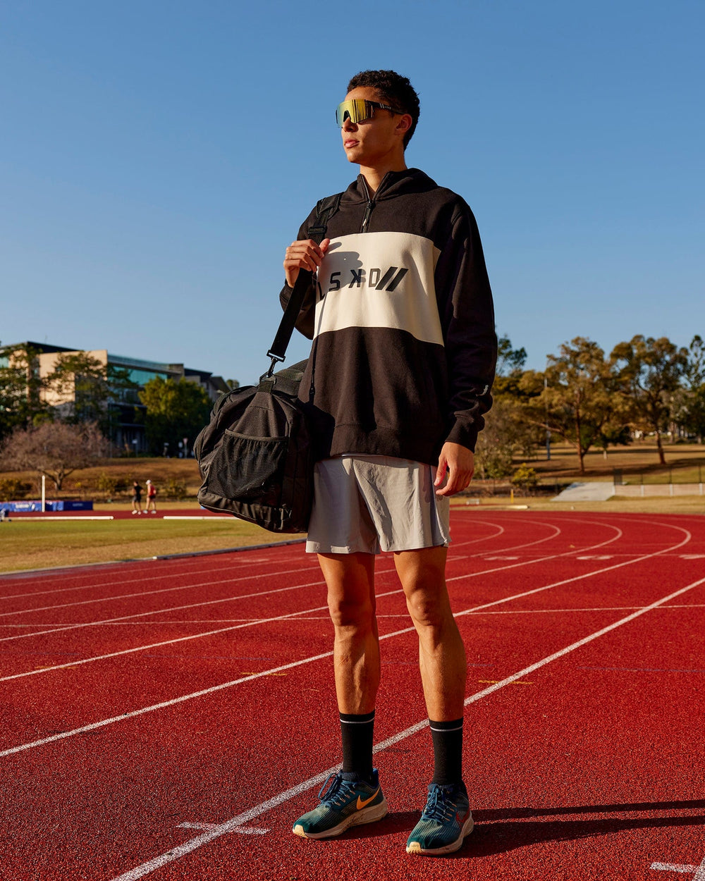 Man wearing Unisex LSKD x Blenders Hoodie - Black-Bone
