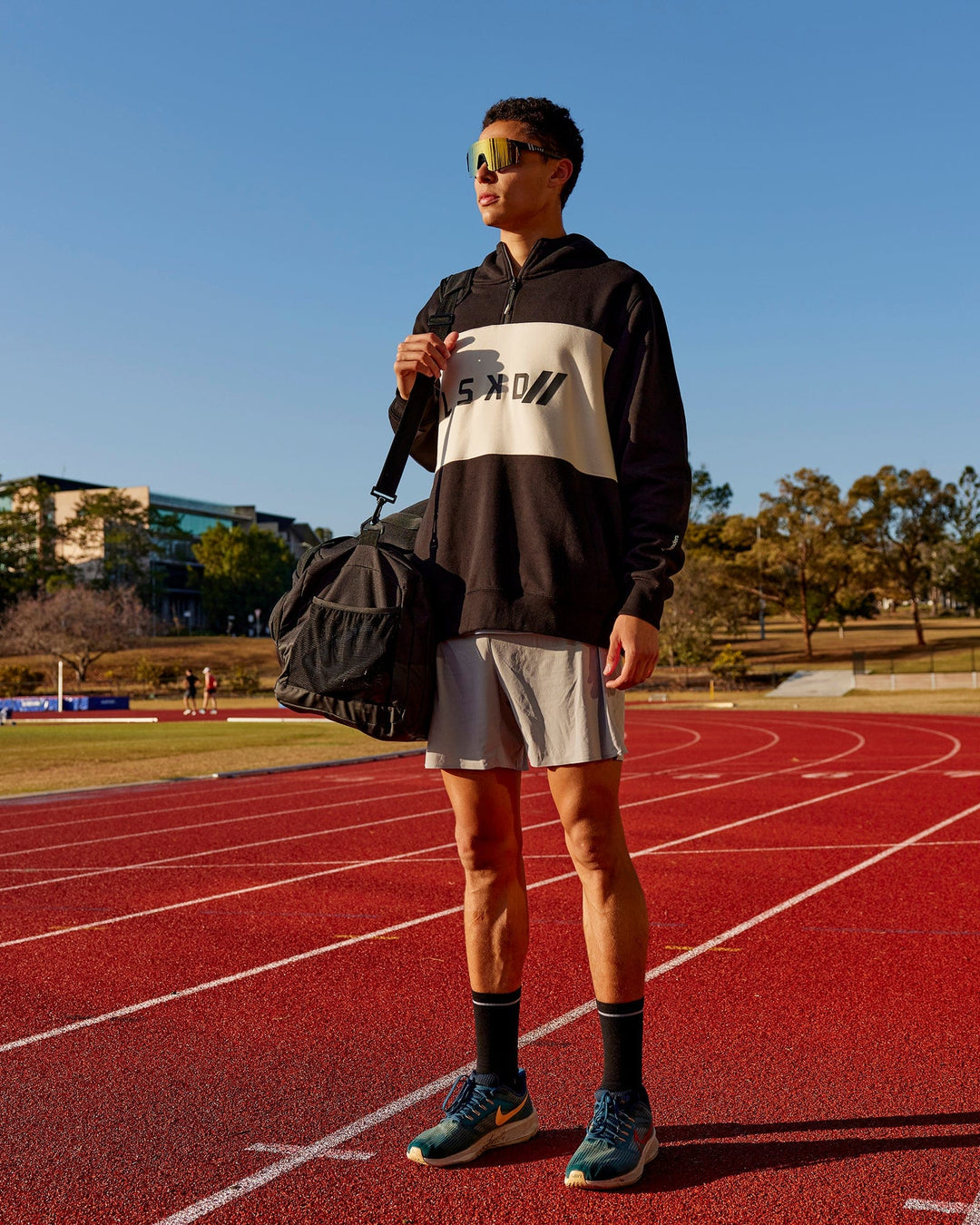 Man wearing Unisex LSKD x Blenders Hoodie - Black-Bone