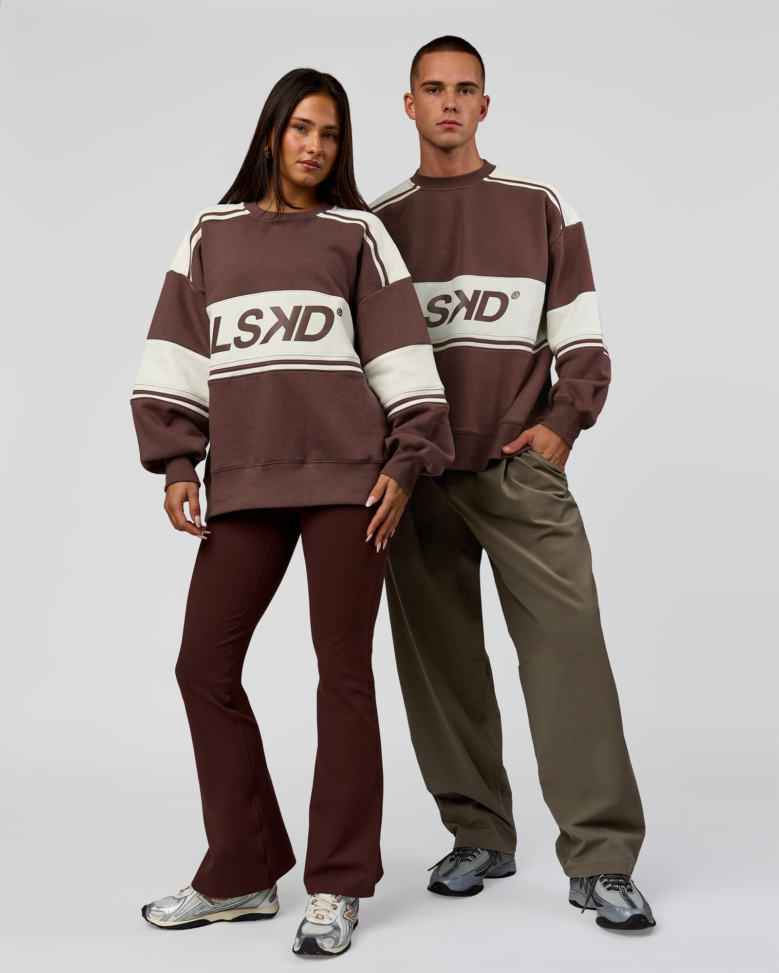 Duo wearing A-Team Sweater Oversize in Cocoa Powder-Off White | Model:Bianca | Size:XS | Model:Albert | Size: M