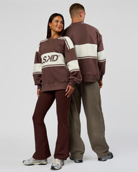 Duo wearing A-Team Sweater Oversize in Cocoa Powder-Off White | Model:Bianca | Size:XS | Model:Albert | Size: M
