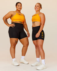 Woman wearing Rep Ultra High-Rise 6" Short Pockets - Black-Zinnia | Model:Duo | Size:Both